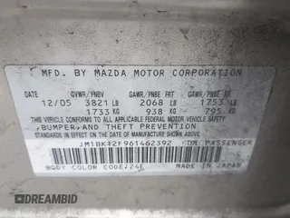 2006 Mazda 3 i Touring with VIN JM1BK12F961462392, listed as a IAAI auction lot 41322168 with 127,511 mi miles and . Bid and sale history available at DreamBid. Image 9.
