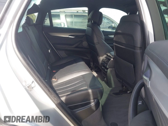 2019 BMW X6 xDrive35i z VIN 5UXKU2C52K0Z63984, wystawiony jako IAAI lot #41612265 z przebiegiem 65 634 mil mil oraz . Historia ofert i sprzedaży dostępna na DreamBid. Obrazek 8.