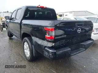 2023 Nissan Frontier SV with VIN 1N6ED1EK7PN609865, listed as a IAAI auction lot 42242070 with 56,462 mi miles and . Bid and sale history available at DreamBid. Image 3.