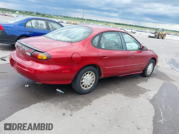 1996 Ford Taurus LX with VIN 1FALP53S2TA221249, listed as a IAAI auction lot 42506786 with 198,272 mi miles and . Bid and sale history available at DreamBid. Image 4.