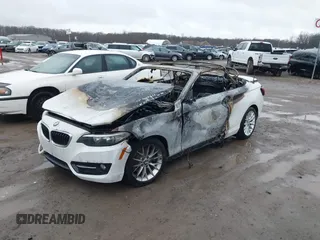 2016 BMW 2 Series 228i xDrive with VIN WBA1L9C56GV325558, listed as a IAAI auction lot 41833671 with 1 mi miles. Bid and sale history available at carsss.com. Image 6.
