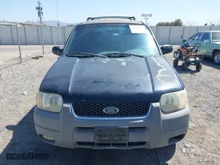 2001 Ford Escape XLT with VIN 1FMYU03141KF43980, listed as a IAAI auction lot 41989002 with 222,344 mi miles. Bid and sale history available at carsss.com. Image 6.