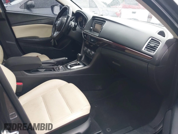 2014 Mazda 6 i Grand Touring с VIN JM1GJ1W66E1141962, выставлен на аукционе IAAI как лот 42119753 с пробегом 187 514 миль миль и . История ставок и продаж доступна на DreamBid. Изображение 5.