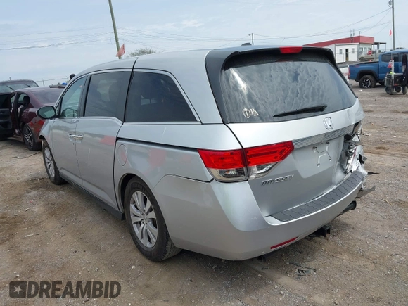 2014 Honda Odyssey EX-L with VIN 5FNRL5H60EB115792, listed as a IAAI auction lot 42064607 with 191,055 mi miles and . Bid and sale history available at carsss.com. Image 3.