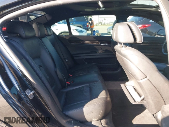 2014 BMW 7 Series 740Li with VIN WBAYE4C56ED137847, listed as a IAAI auction lot 39452255 with 184,471 mi miles. Bid and sale history available at carsss.com. Image 8.