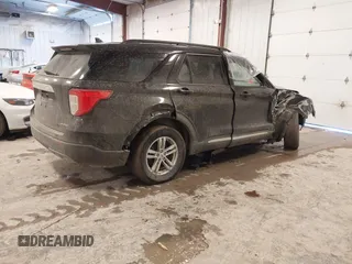 2021 Ford Explorer XLT with VIN 1FMSK8DH1MGB69650, listed as a IAAI auction lot 41651245 with 58,708 mi miles. Bid and sale history available at carsss.com. Image 4.