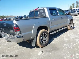 2014 Toyota Tacoma PreRunner with VIN 5TFJU4GNXEX061808, listed as a IAAI auction lot 41585931 with 214,240 mi miles. Bid and sale history available at carsss.com. Image 4.