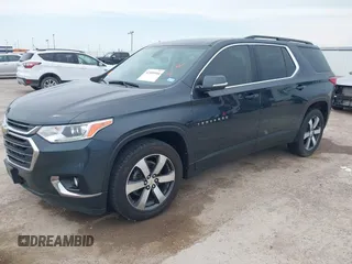 2021 Chevrolet Traverse LT with VIN 1GNERHKW4MJ191814, listed as a IAAI auction lot 42185544 with 87,493 mi miles and . Bid and sale history available at DreamBid. Image 2.