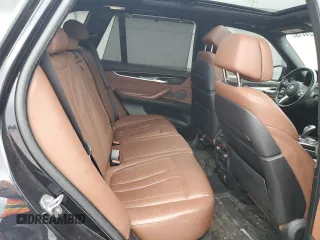 2015 BMW X5 xDrive35i z VIN 5UXKR0C59F0P13587, wystawiony jako Copart lot #57224415 z przebiegiem 155 131 mil mil oraz Szkoda całkowita • Salvage title. Historia ofert i sprzedaży dostępna na DreamBid. Obrazek 11.