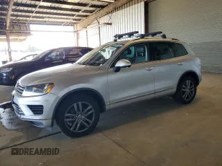 2016 Volkswagen Touareg Sport с VIN WVGEF9BP8GD009532, выставлен на аукционе Copart как лот 57659455 с пробегом 67 741 миль миль и Списание • Salvage title. История ставок и продаж доступна на DreamBid. Изображение 1.