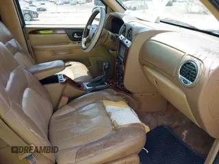 2003 GMC Envoy SLE with VIN 1GKES16S136153880, listed as a IAAI auction lot 42009798 with 289,208 mi miles and . Bid and sale history available at DreamBid. Image 5.