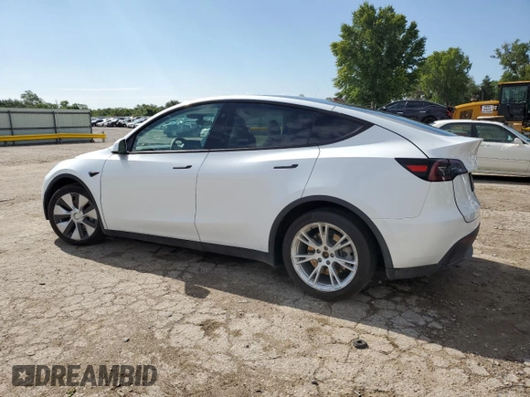 2023 Tesla Model Y Long Range with VIN 7SAYGAEE6PF795434, listed as a Copart auction lot 67507984 with 24,469 mi miles and Salvage Title. Bid and sale history available at DreamBid. Image 2.