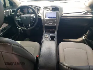 2020 Ford Fusion SE z VIN 3FA6P0HD9LR148574, wystawiony jako Copart lot #56694155 z przebiegiem 89 994 mil mil oraz Szkoda całkowita • Salvage title. Historia ofert i sprzedaży dostępna na DreamBid. Obrazek 8.