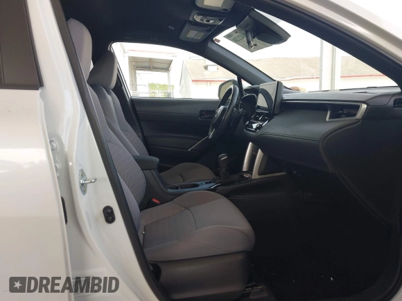 2023 Toyota Corolla Cross Hybrid S with VIN 7MUFBABG3PV001144, listed as a IAAI auction lot 42442124 with 116,674 mi miles and . Bid and sale history available at DreamBid. Image 5.
