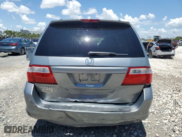 2007 Honda Odyssey EX z VIN 5FNRL38467B027951, wystawiony jako Copart lot #60109725 z przebiegiem 137 718 mil mil oraz Szkoda całkowita • Salvage title. Historia ofert i sprzedaży dostępna na DreamBid. Obrazek 6.