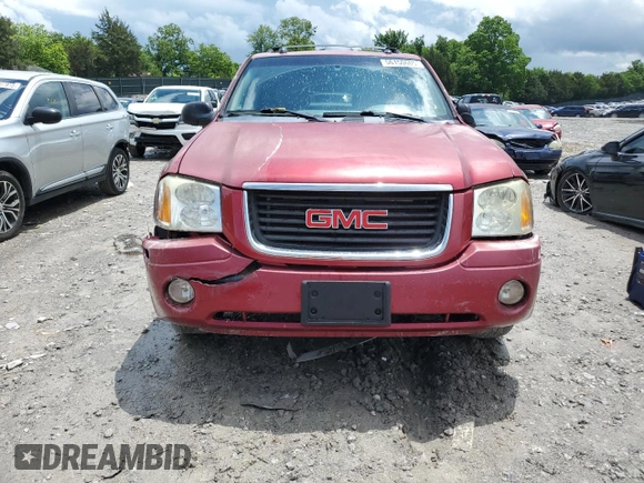 2005 GMC Envoy SLE z VIN 1GKDT13S752203494, wystawiony jako Copart lot #56150605 z przebiegiem 243 475 mil mil oraz Szkody całkowita. Historia ofert i sprzedaży dostępna na DreamBid. Obrazek 5.