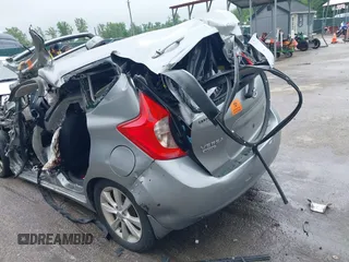 2014 Nissan Note S Plus z VIN 3N1CE2CP7EL373942, wystawiony jako IAAI lot #42187563 z przebiegiem Nie podano mil oraz . Historia ofert i sprzedaży dostępna na DreamBid. Obrazek 14.