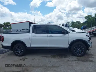 2024 Honda Ridgeline Sport with VIN 5FPYK3F14RB011166, listed as a IAAI auction lot 42591313 with 5,175 mi miles and . Bid and sale history available at DreamBid. Image 13.