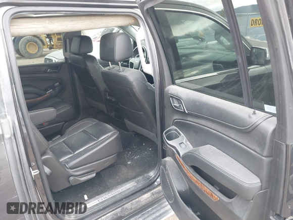 2018 Chevrolet Suburban Premier z VIN 1GNSKJKC3JR189621, wystawiony jako IAAI lot #41925416 z przebiegiem 150 775 mil mil oraz . Historia ofert i sprzedaży dostępna na DreamBid. Obrazek 8.