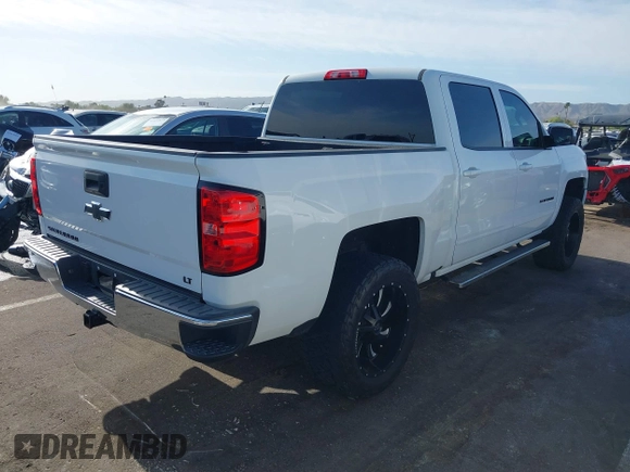 2016 Chevrolet Silverado 1500 LT with VIN 3GCPCREC1GG323802, listed as a IAAI auction lot 42008208 with 85,609 mi miles and . Bid and sale history available at DreamBid. Image 4.
