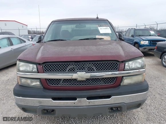 2003 Chevrolet Silverado 1500 LS with VIN 2GCEK19TX31219785, listed as a IAAI auction lot 41716084 with 297,991 mi miles. Bid and sale history available at carsss.com. Image 6.