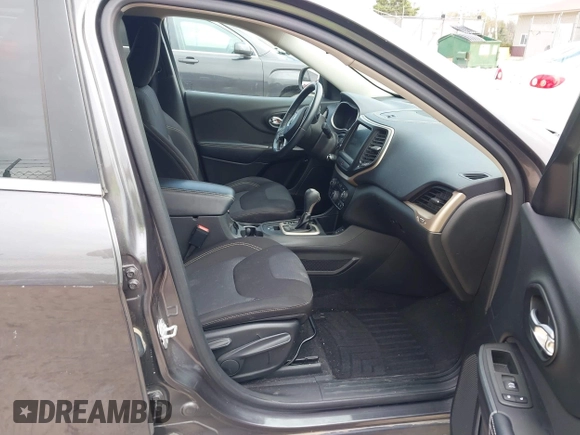 2015 Jeep Cherokee Latitude with VIN 1C4PJLCS9FW542181, listed as a IAAI auction lot 42183167 with 144,607 mi miles and . Bid and sale history available at carsss.com. Image 5.