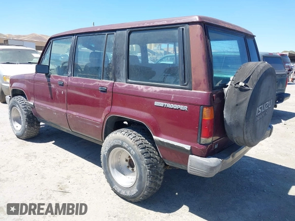 1991 Isuzu Trooper z VIN JACCH58R8M7904079, wystawiony jako IAAI lot #42303036 z przebiegiem 244 672 mil mil oraz . Historia ofert i sprzedaży dostępna na DreamBid. Obrazek 3.