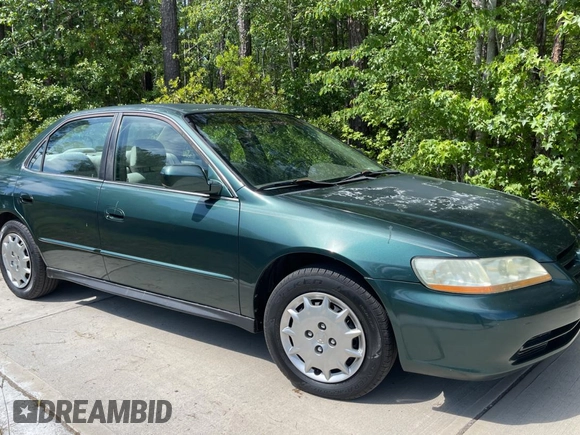 2002 Honda Accord LX z VIN 1HGCG56442A044999, wystawiony jako Copart lot #56222325 z przebiegiem Nie podano mil oraz Czysty tytuł • Clean title. Historia ofert i sprzedaży dostępna na DreamBid. Obrazek 1.