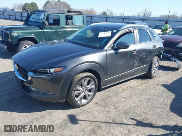 2022 Mazda CX-30 S Select with VIN 3MVDMBBL2NM442323, listed as a IAAI auction lot 41765707 with 40,848 mi miles and . Bid and sale history available at DreamBid. Image 2.