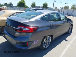 2018 Honda Clarity Touring z VIN JHMZC5F33JC021811, wystawiony jako IAAI lot #42272808 z przebiegiem 82 414 mil mil oraz . Historia ofert i sprzedaży dostępna na DreamBid. Obrazek 4.