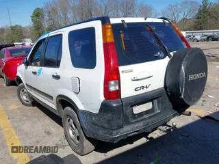 2002 Honda CR-V LX with VIN SHSRD68482U002257, listed as a IAAI auction lot 41644489 with 290,000 mi miles and . Bid and sale history available at carsss.com. Image 3.