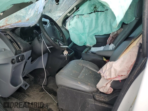 2019 Ford Transit with VIN 1FTYR2CM7KKB65988, listed as a Copart auction lot 56770645 with Not Provided miles and Salvage Title. Bid and sale history available at DreamBid. Image 7.