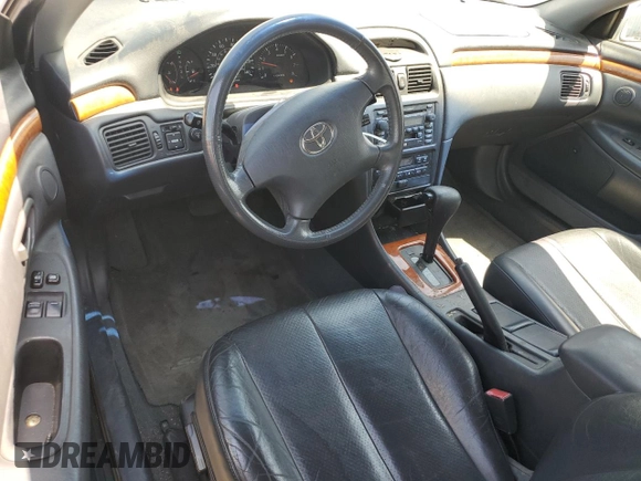 2002 Toyota Solara SE z VIN 2T1CF28P62C575561, wystawiony jako Copart lot #59748025 z przebiegiem 108 748 mil mil oraz Szkoda całkowita • Salvage title. Historia ofert i sprzedaży dostępna na DreamBid. Obrazek 8.