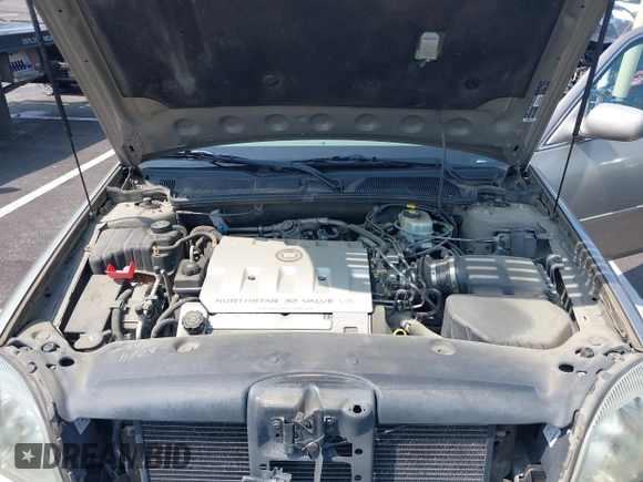 2002 Cadillac DeVille z VIN 1G6KD54Y12U219770, wystawiony jako IAAI lot #42474317 z przebiegiem 122 776 mil mil oraz . Historia ofert i sprzedaży dostępna na DreamBid. Obrazek 10.