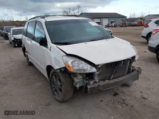2004 Toyota Sienna LE with VIN 5TDBA23C14S022101, listed as a IAAI auction lot 41879798 with 99,964 mi miles. Bid and sale history available at carsss.com. Image 1.