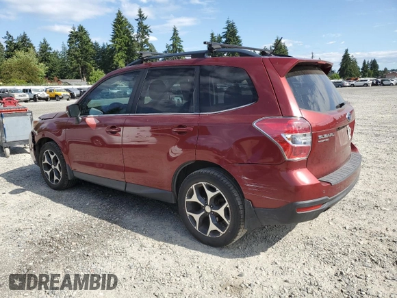 2014 Subaru Forester XT Touring with VIN JF2SJGMC0EH513844, listed as a Copart auction lot 61162355 with 56,887 mi miles and Salvage title. Bid and sale history available at DreamBid. Image 2.