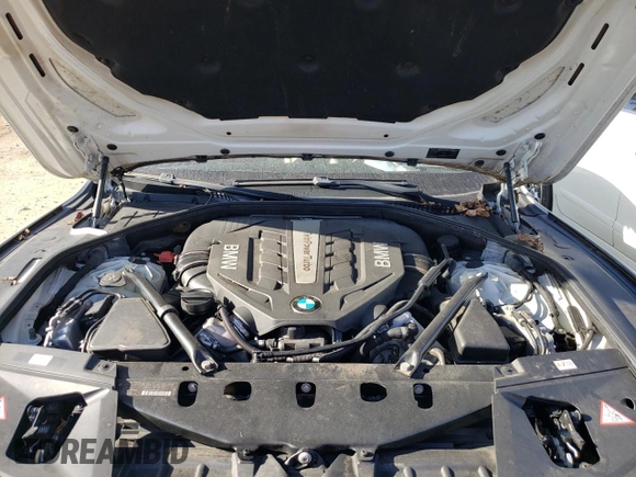 2013 BMW 7 Series 750i with VIN WBAYA8C55DC996693, listed as a Copart auction lot 80233423 with 140,925 mi miles and Salvage Title. Bid and sale history available at DreamBid. Image 11.