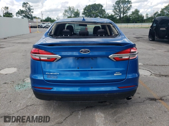 2020 Ford Fusion SE z VIN 3FA6P0HD9LR148574, wystawiony jako Copart lot #56694155 z przebiegiem 89 994 mil mil oraz Szkoda całkowita • Salvage title. Historia ofert i sprzedaży dostępna na DreamBid. Obrazek 6.