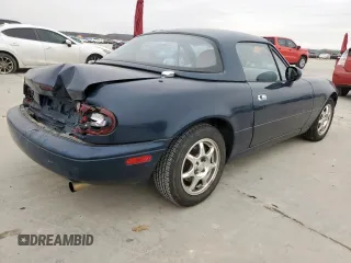 1994 Mazda MX-5 Miata with VIN JM1NA3537R0512679, listed as a Copart auction lot 45649075 with 126,476 mi miles and Salvage title. Bid and sale history available at DreamBid. Image 3.