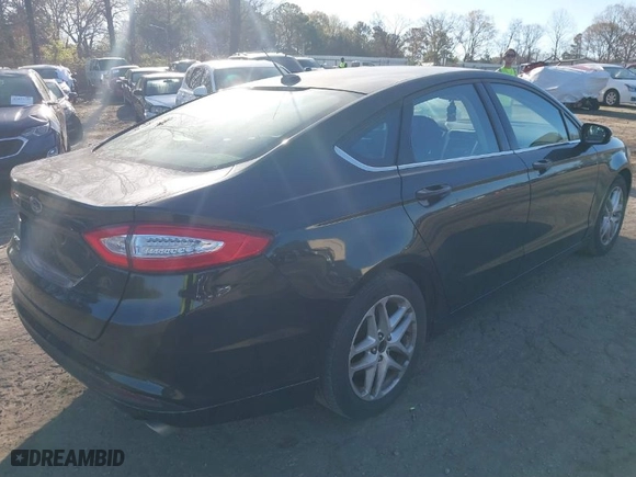 2014 Ford Fusion SE with VIN 3FA6P0H71ER178889, listed as a IAAI auction lot 41883131 with 236,447 mi miles. Bid and sale history available at carsss.com. Image 4.