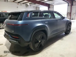 2023 Fisker Ocean One z VIN VCF1ZBU28PG004977, wystawiony jako Copart lot #71588194 z przebiegiem 14 737 mil mil oraz Szkody całkowita. Historia ofert i sprzedaży dostępna na DreamBid. Obrazek 3.