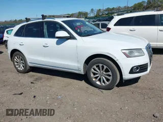 2013 Audi Q5 Premium Plus with VIN WA1LFAFP9DA027214, listed as a IAAI auction lot 42040393 with 173,280 mi miles. Bid and sale history available at carsss.com. Image 1.