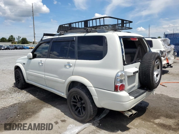 2004 Suzuki XL7 LX with VIN JS3TX92V444107106, listed as a Copart auction lot 62322035 with 94,380 mi miles and Salvage title. Bid and sale history available at DreamBid. Image 2.