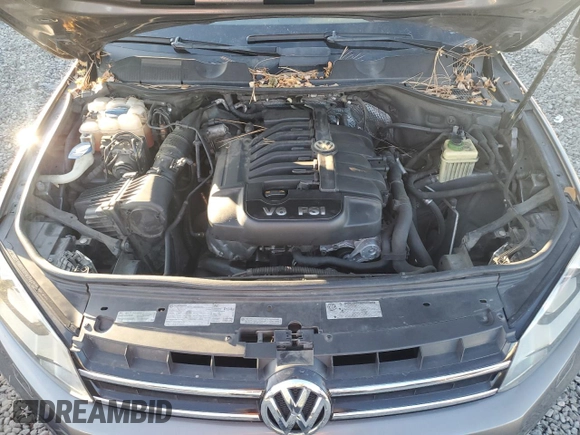 2013 Volkswagen Touareg Lux with VIN WVGEF9BPXDD002285, listed as a Copart auction lot 82248604 with 150,780 mi miles and Salvage Title. Bid and sale history available at DreamBid. Image 11.