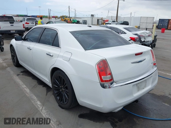2012 Chrysler 300 Limited with VIN 2C3CCACG2CH237841, listed as a IAAI auction lot 42134640 with 140,554 mi miles. Bid and sale history available at carsss.com. Image 3.