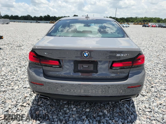 2021 BMW 5 Series 530i xDrive with VIN WBA13BJ00MWX12997, listed as a Copart auction lot 60900435 with 55,064 mi miles and Salvage title. Bid and sale history available at DreamBid. Image 6.