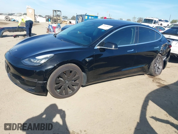 2018 Tesla Model 3 Long Range Battery with VIN 5YJ3E1EA0JF056979, listed as a IAAI auction lot 41865849 with 97,319 mi miles. Bid and sale history available at carsss.com. Image 20.