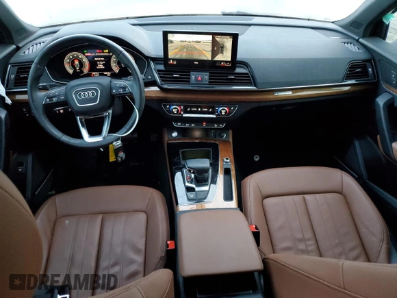 2023 Audi Q5 S line Premium Plus z VIN WA1EAAFY4P2035574, wystawiony jako Copart lot #55351055 z przebiegiem 19 777 mil mil oraz Szkoda całkowita • Salvage title. Historia ofert i sprzedaży dostępna na DreamBid. Obrazek 8.