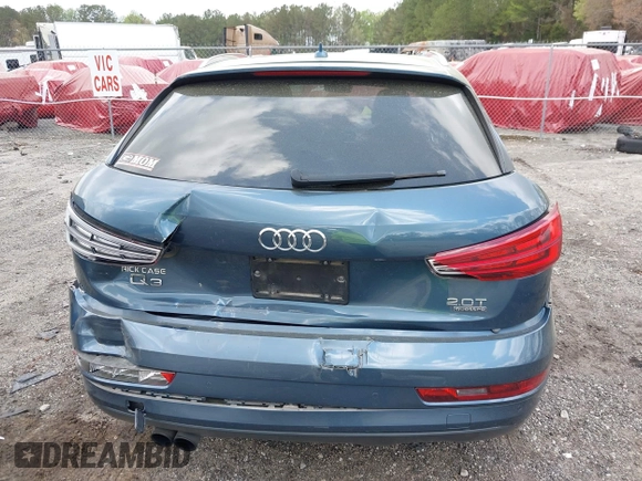 2018 Audi Q3 Premium Plus z VIN WA1JCCFS8JR014631, wystawiony jako IAAI lot #41958696 z przebiegiem 94 063 mil mil oraz . Historia ofert i sprzedaży dostępna na DreamBid. Obrazek 16.