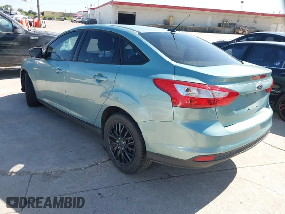 2012 Ford Focus SE with VIN 1FAHP3F20CL356322, listed as a IAAI auction lot 42088397 with 130,600 mi miles. Bid and sale history available at carsss.com. Image 3.